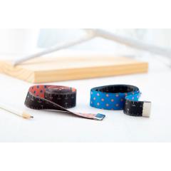 Krejčovský metr na zakázku Caruso